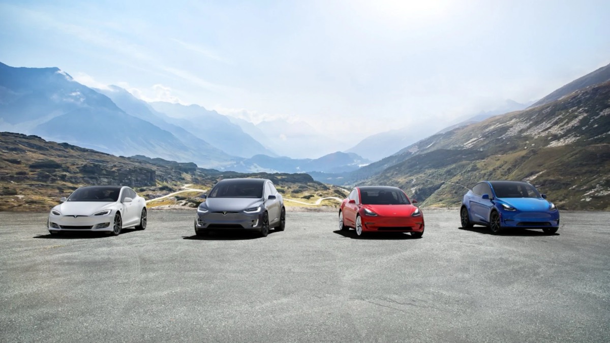 Tesla Model S, Model X, Model 3 and Model Y in a mountain valley