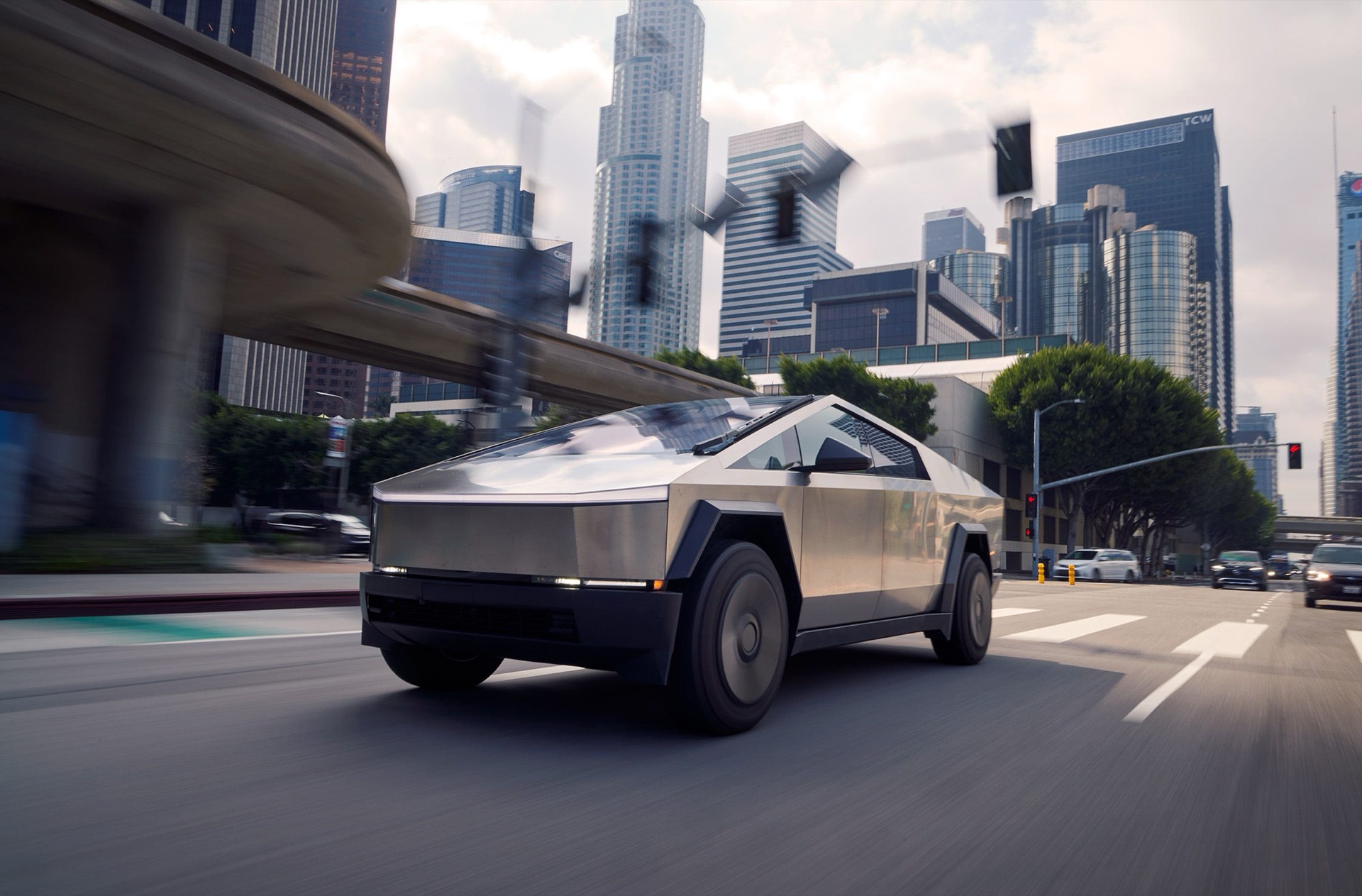 Tesla Cybertruck on a city street among skyscrapers