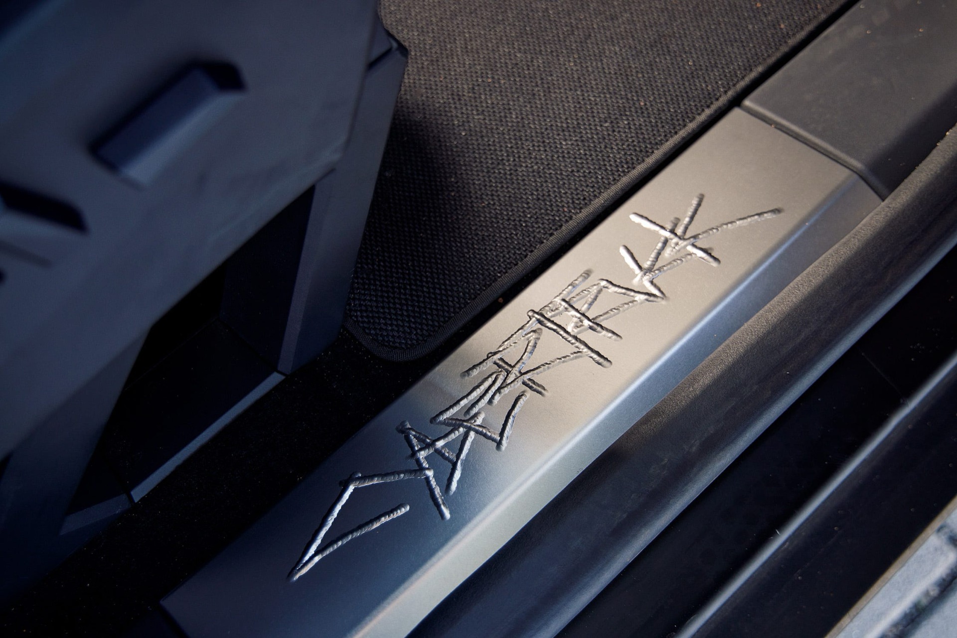 Tesla Cybertruck – Cybertruck lettering on the door sill